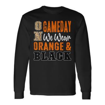 On Gameday Football We Wear Orange And Black School Spirit Long Sleeve T-Shirt - Thegiftio UK