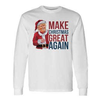 面白いクリスマスグレートアゲイントランプサンタファンusaホリデー 2024 長袖Tシャツ - Kawaiitshirt