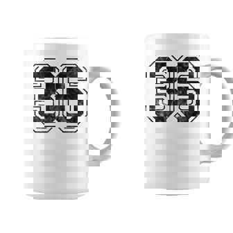 背中に36番。 コーヒーマグ - Kawaiitshirt