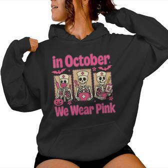 In October We Wear Pink Nurse Skeleton Breast Cancer Women Hoodie - Thegiftio UK