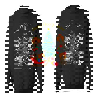 アグリー ハッピーデコピンクリスマス コーイケルホンディエ犬 ダッチデコイスパニエル犬 スウェットシャツ - Kawaiitshirt