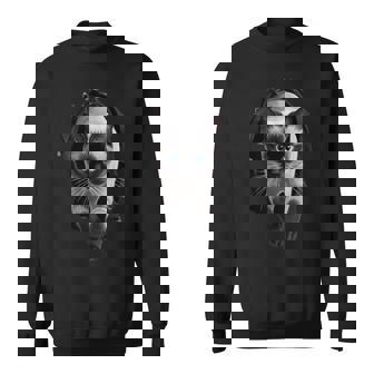 シャム猫が破れた布を突き破り、猫好きに最適です。 スウェットシャツ - Kawaiitshirt