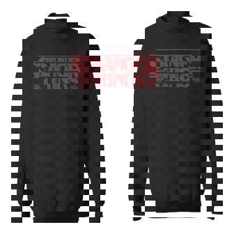 ストレンジャー・シングス クリスマスロゴ アグリークリスマス スノーフレーク柄 スウェットシャツ - Kawaiitshirt