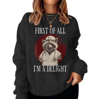 First Of All I'm A Delight Raccoon Nurse Raccoon Women Sweatshirt - Thegiftio UK
