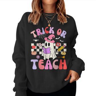 Trick Or Teach Halloween Groovy Teacher Retro Floral Ghost Women Sweatshirt - Thegiftio UK