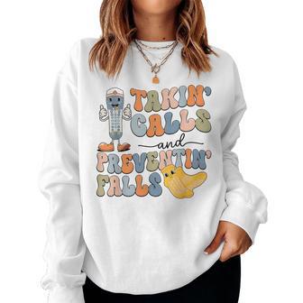 Nurse Fall Risk Socks Humor Takin Calls Preventin Falls Women Sweatshirt - Thegiftio UK