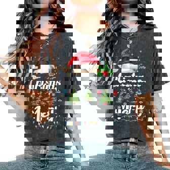 メリークリスマスライト 赤いサンタ帽子 クリスマス ファミリー 男性 女性 レディースオーバーサイズコンフォートTシャツ - Kawaiitshirt