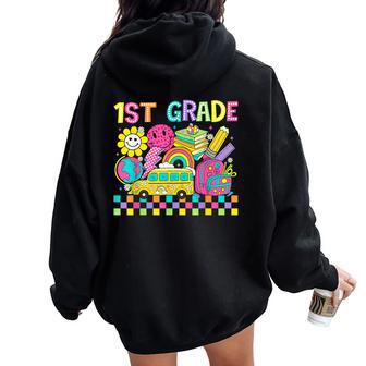 First Grade Retro Groovy Back To School First Day Teacher Women Oversized Hoodie Back Print - Thegiftio UK