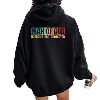 Man Of God Husband Dad Protector Christian Faith Fathers Day Women Oversized Hoodie Back Print - Thegiftio UK