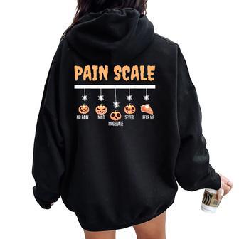 Spooky Pumpkin Pain Scale Trauma Nurse Triage Halloween Fall Women Oversized Hoodie Back Print - Thegiftio UK