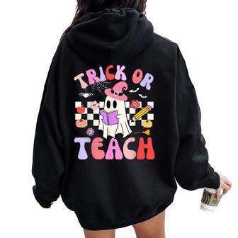 Trick Or Teach Halloween Groovy Teacher Retro Floral Ghost Women Oversized Hoodie Back Print - Thegiftio UK