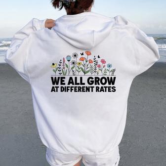 We All Grow At Different Rates Teacher Inclusion Learning Women Oversized Hoodie Back Print - Thegiftio UK