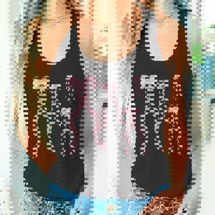 ファンシーピンクのリボンデザイン。 タンクトップ