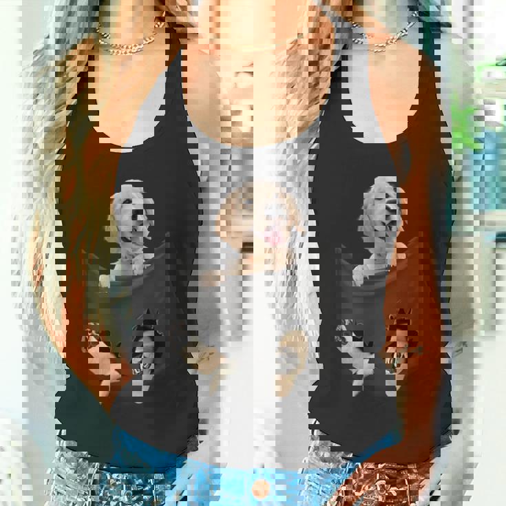 ポケットに入ったゴールデンレトリーバーの犬 ゴールデンパピー のぞき見 タンクトップ