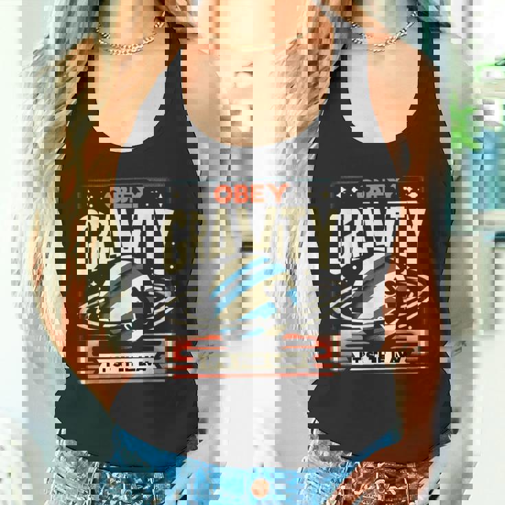 重力に従いなさい、それが法です Obey Gravity It's The Law タンクトップ