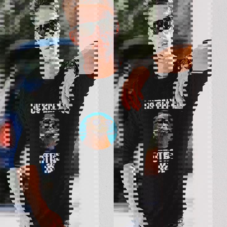 カワウソ 動物 カワウソ 長袖Tシャツ 彼への贈り物