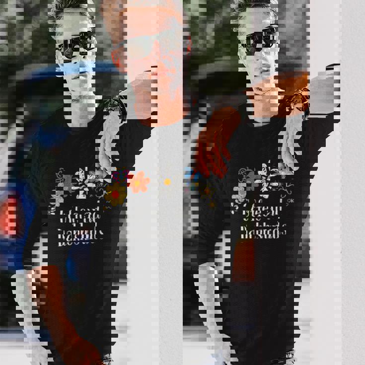 面白いコーヒーとダックスフントの花を言う 長袖Tシャツ 彼への贈り物