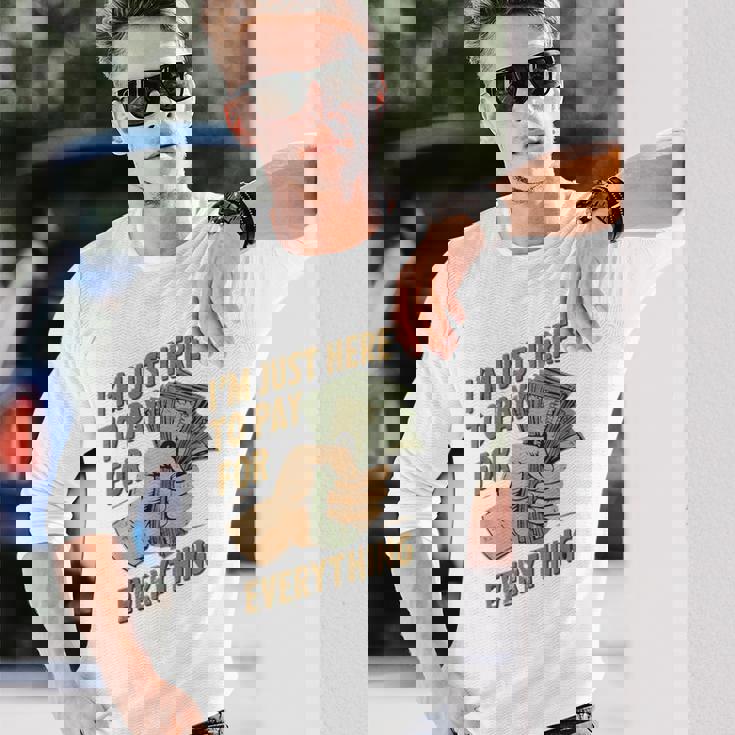 おもしろいママとパパが払うもの全部払うためにここに来たんだ 長袖Tシャツ 彼への贈り物