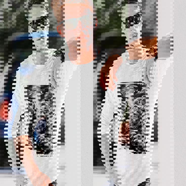 イエティ Ufo 平和 クリプティッド ユーモア マウンテン遭遇 長袖tシャツ 長袖Tシャツ 彼への贈り物