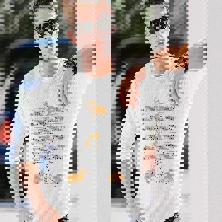 コーギー 犬 音符 音符 ミュージシャン かわいい コーギー 犬 長袖Tシャツ 彼への贈り物