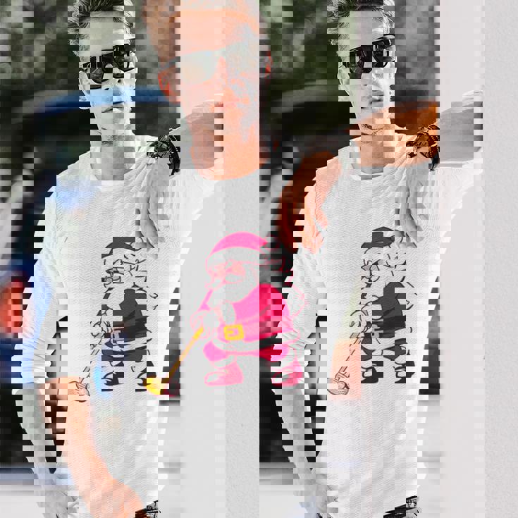 ゴルフをする面白い醜いクリスマスサンタ。 長袖Tシャツ 彼への贈り物