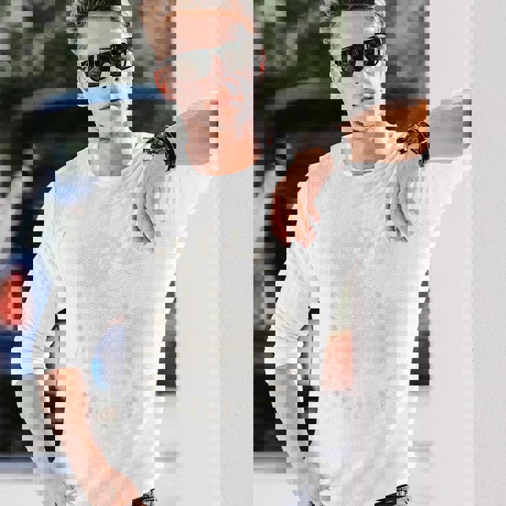 レトロ クリスマス メレ カリキマカ サンタクロース シャカ ハワイ 長袖Tシャツ 彼への贈り物