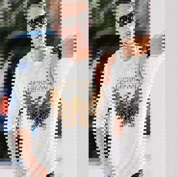 ローマを再び偉大にする ローマの土星 サトゥルナーリア クリスマス 長袖tシャツ 長袖Tシャツ 彼への贈り物