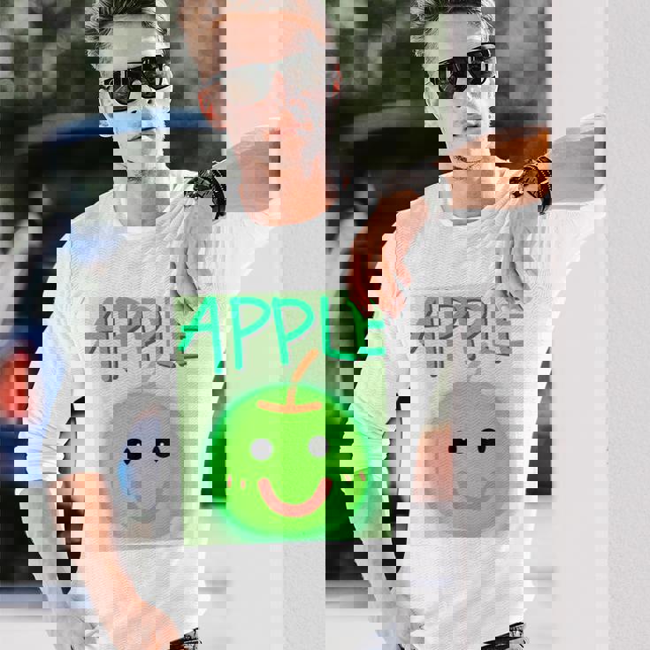 日本 りんご 青りんご かわいい 笑顔 長袖Tシャツ 彼への贈り物