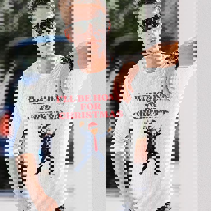 面白いトランプサンタハット、クリスマスに家に帰るよ 長袖tシャツ 長袖Tシャツ 彼への贈り物