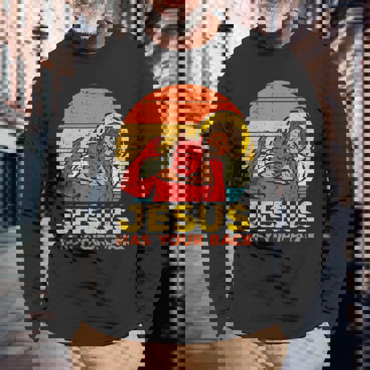Jesus Has Your Back 柔術 レトロ クリスチャン 長袖Tシャツ 高齢者への贈り物