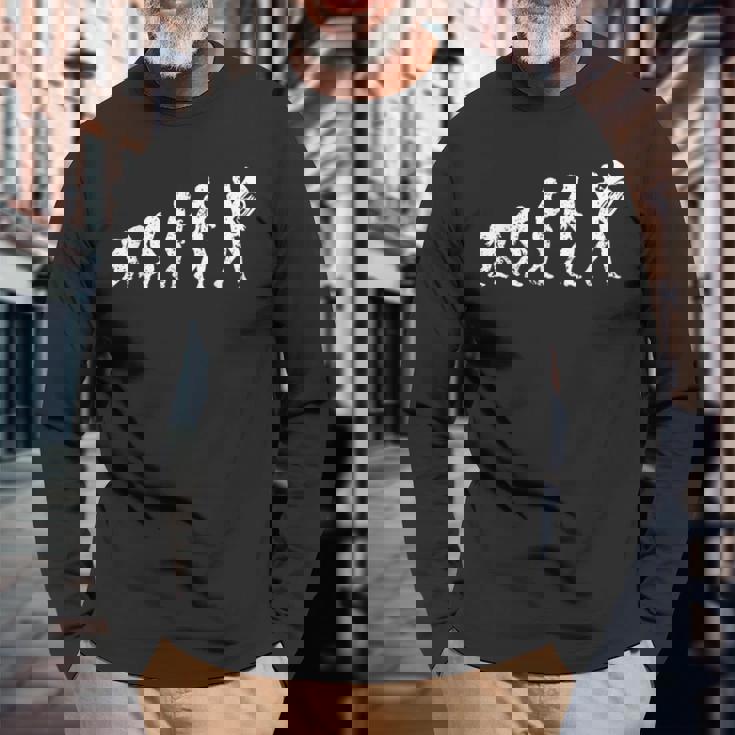 おかしなマーチングバンド ミュージシャン チューバ奏者 人類の進化 長袖Tシャツ 高齢者への贈り物