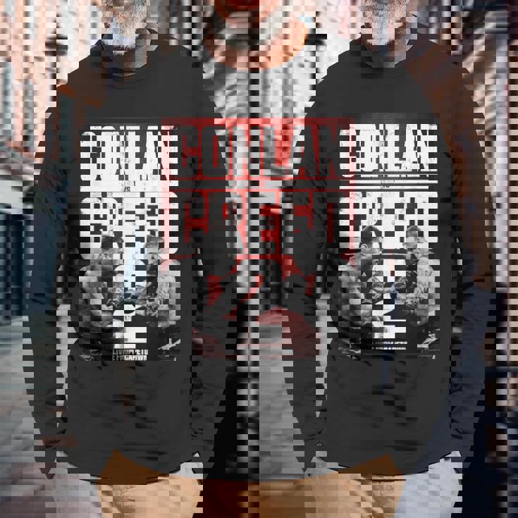 アドニスクリード—ケープタウンからのコンラン対クリード2ライブ 長袖Tシャツ 高齢者への贈り物