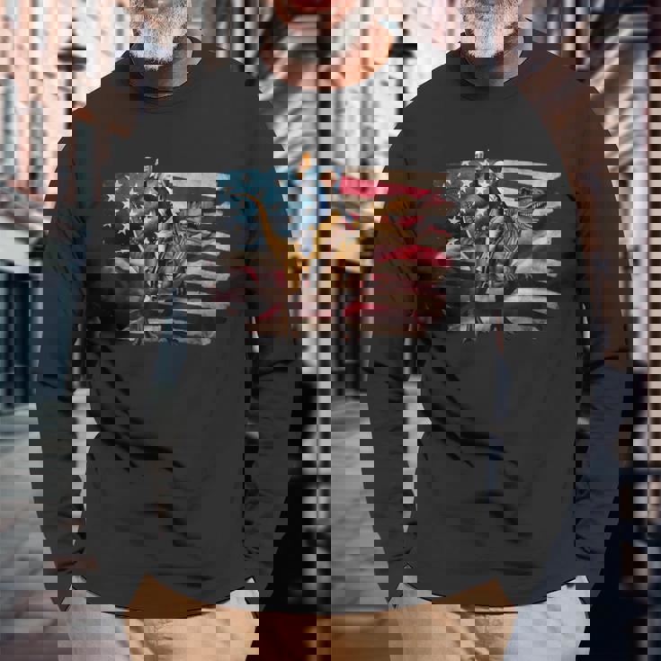 ジョージ・ワシントン ライディング A ダイナソー 面白い 4Th Of July デザイン 長袖Tシャツ 高齢者への贈り物