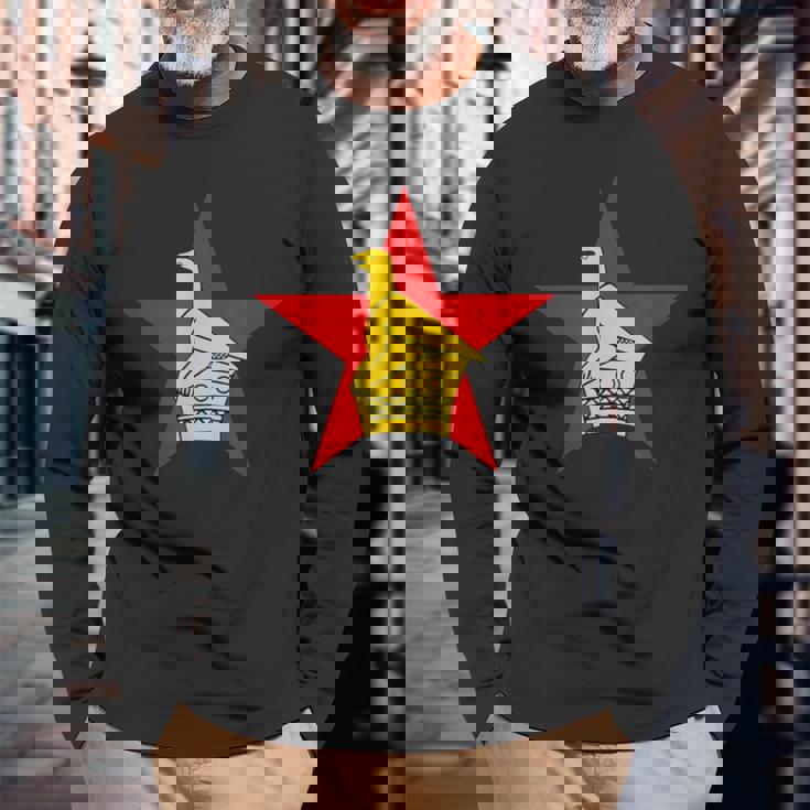 ジンバブエ ソープストーン バードフラッグ 長袖Tシャツ 高齢者への贈り物