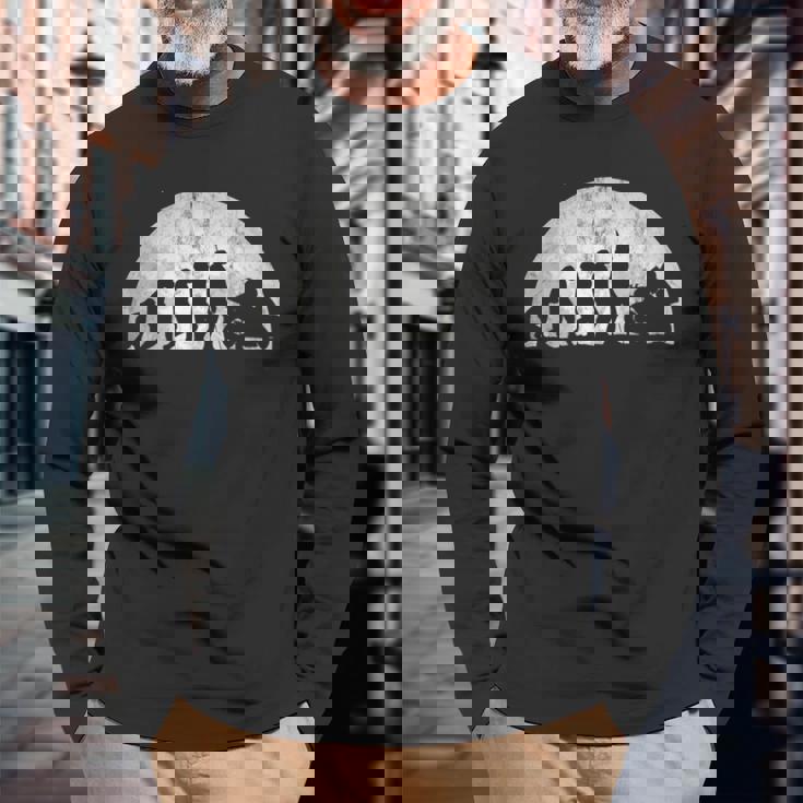 バイカーの進化-人間のモーターサイクルモータースポーツの進化 長袖Tシャツ 高齢者への贈り物