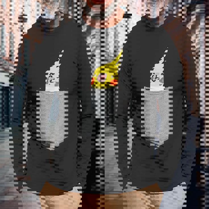 ポケットから覗くオカメインコのデザイン 長袖Tシャツ 高齢者への贈り物