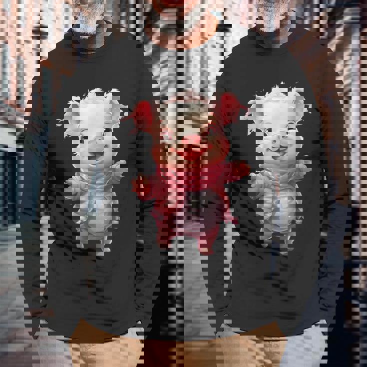 帽子とスカーフを着た豚のクリスマスプレゼント 長袖Tシャツ 高齢者への贈り物