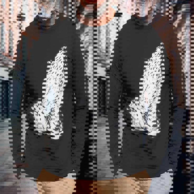 祈るイエスの手 長袖Tシャツ 高齢者への贈り物