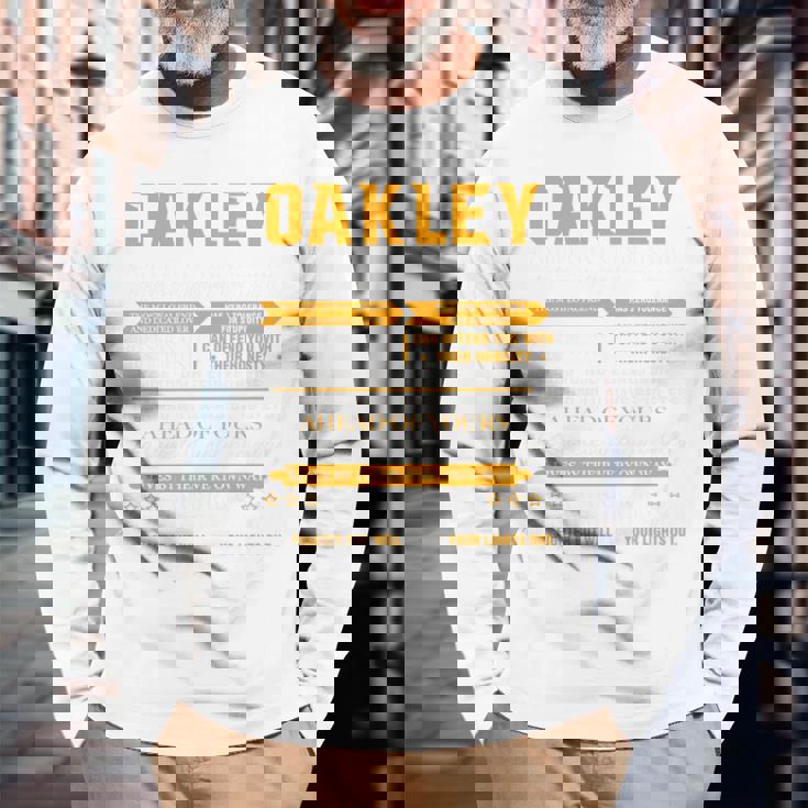 Oakleyオークリー 完全訳不明なネームシャツ フロントプリント 1Kana 長袖tシャツ 長袖Tシャツ 高齢者への贈り物