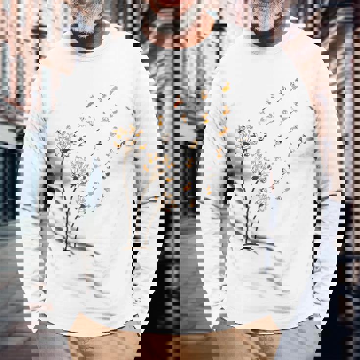 コーギー フラワー フライ タンポポ 面白い かわいい 犬好き ウェルシュ コーギー 長袖Tシャツ 高齢者への贈り物