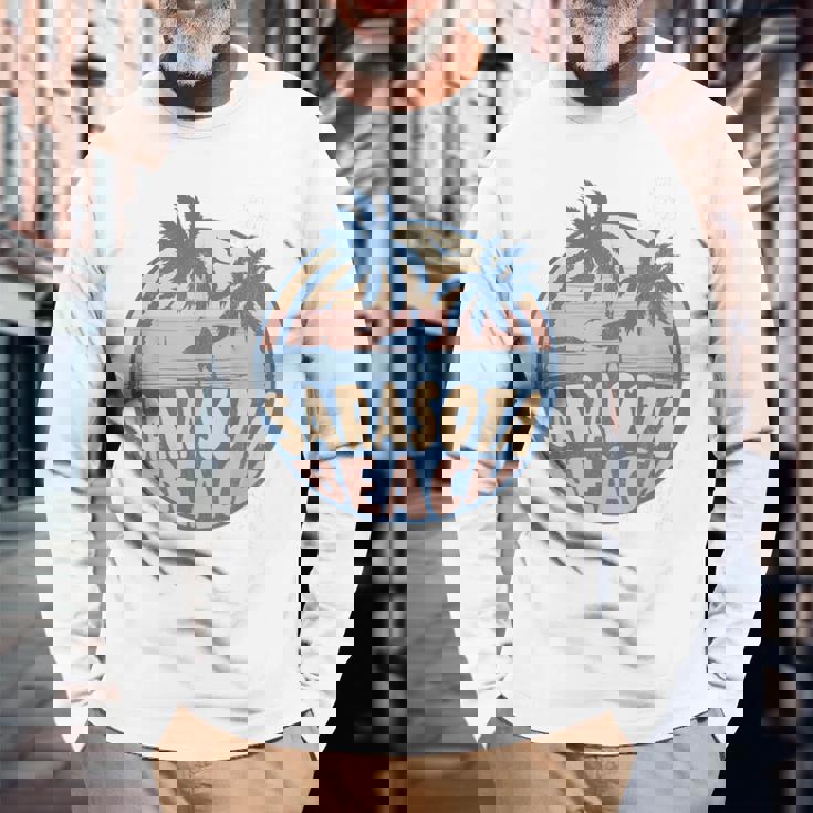 サラソタ フロリダ ビーチ サーフ 夏休み ヴィンテージ 長袖Tシャツ 高齢者への贈り物