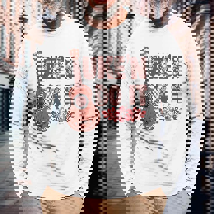 ハワイアンウクレレ ウケアンドドゥイットフラワー 長袖Tシャツ 高齢者への贈り物