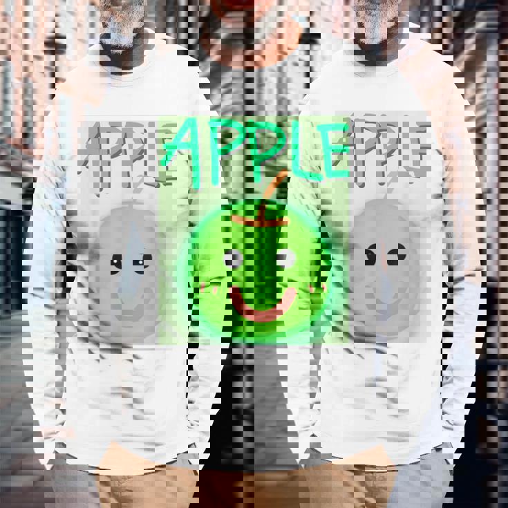 日本 りんご 青りんご かわいい 笑顔 長袖Tシャツ 高齢者への贈り物