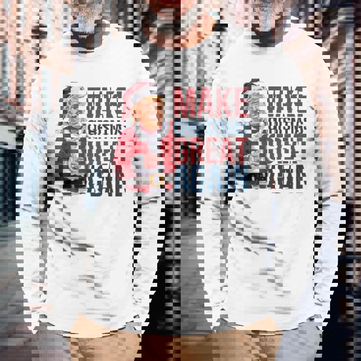 面白いクリスマスグレートアゲイントランプサンタファンusaホリデー 2024 長袖Tシャツ 高齢者への贈り物