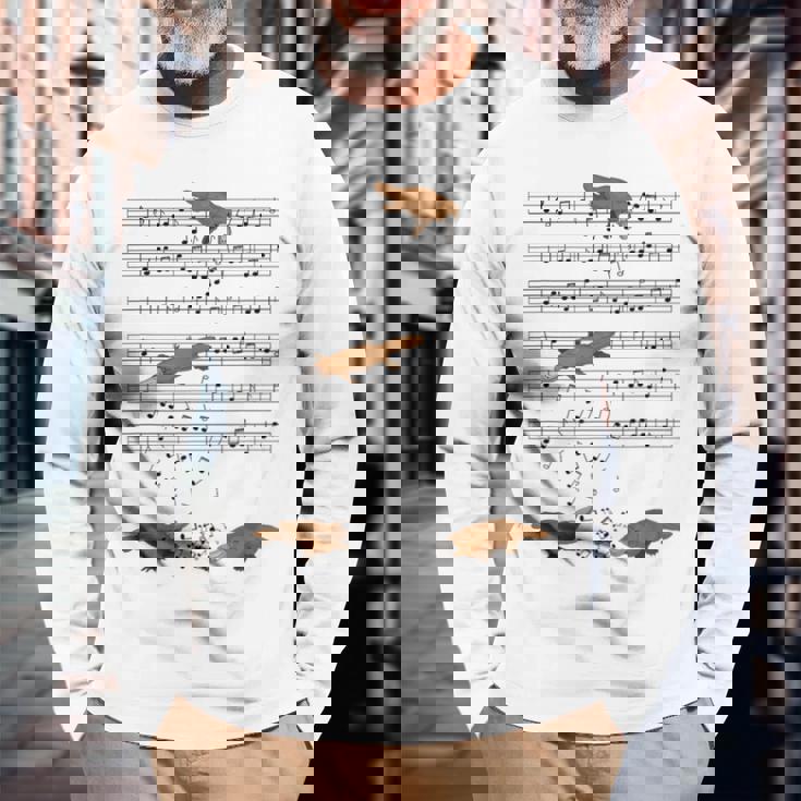 音符で遊ぶ面白いカモノハシ 長袖Tシャツ 高齢者への贈り物