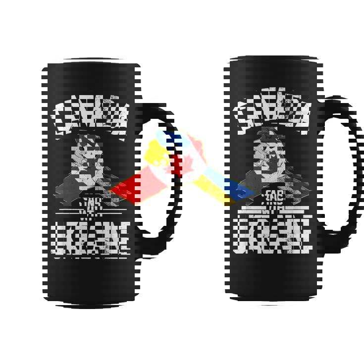 カナダはウクライナのウクライナのカナダの旗のtシャツで立ちます コーヒーマグ