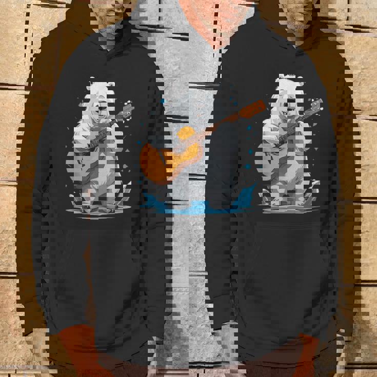 クマがアコースティックギターを弾くクマのギタリスト パーカー ライフスタイル