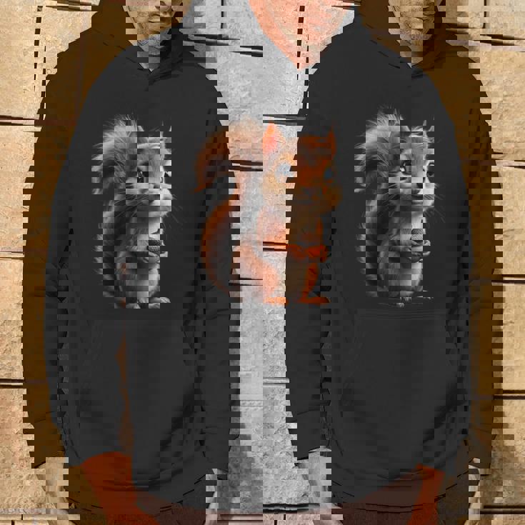 ドングリを持ったかわいいリスのデザイン パーカー ライフスタイル