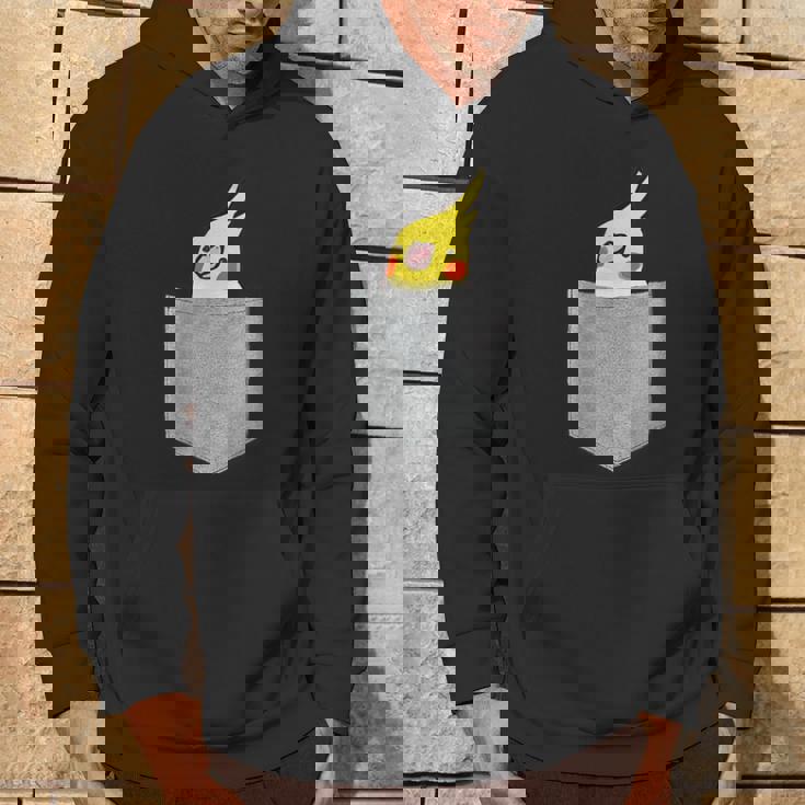 ポケットから覗くオカメインコのデザイン パーカー ライフスタイル