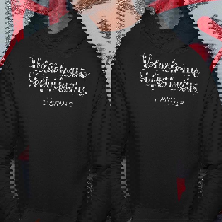 We Love Because He First Loved Us キリスト教の聖句 パーカー 面白い贈り物